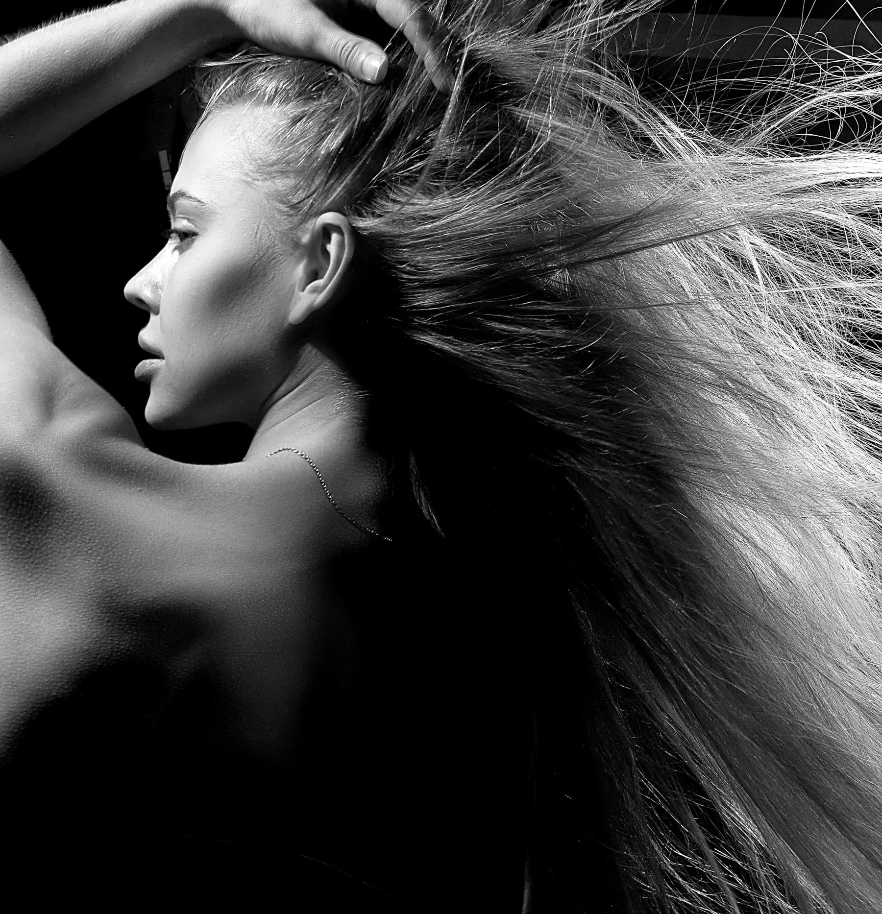 Long hair caught mid-flip in motion